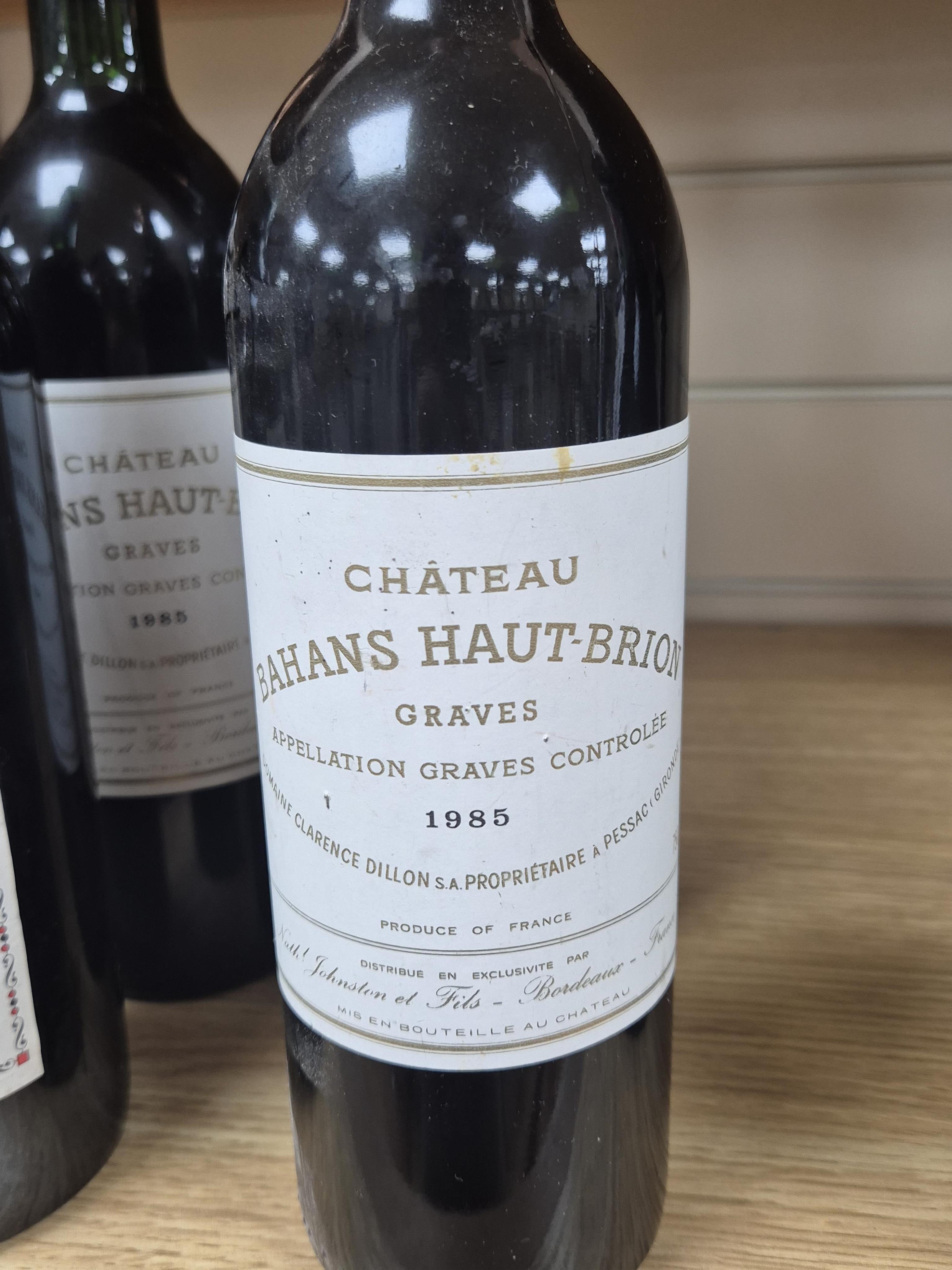 Four bottles of Bordeaux red wine comprising three Chateau Bahans Haut-Brion, 1985 and one Chateau Tour de L'Esperance, 1985